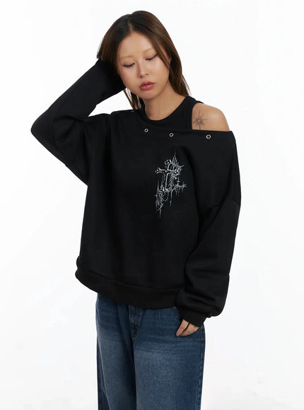 off-shoulder-eyelet-graphic-sweater-in528 / Black